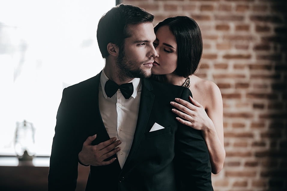 Mississauga Custom Suits hero, couple in bespoke formalwear by Peter Parvez